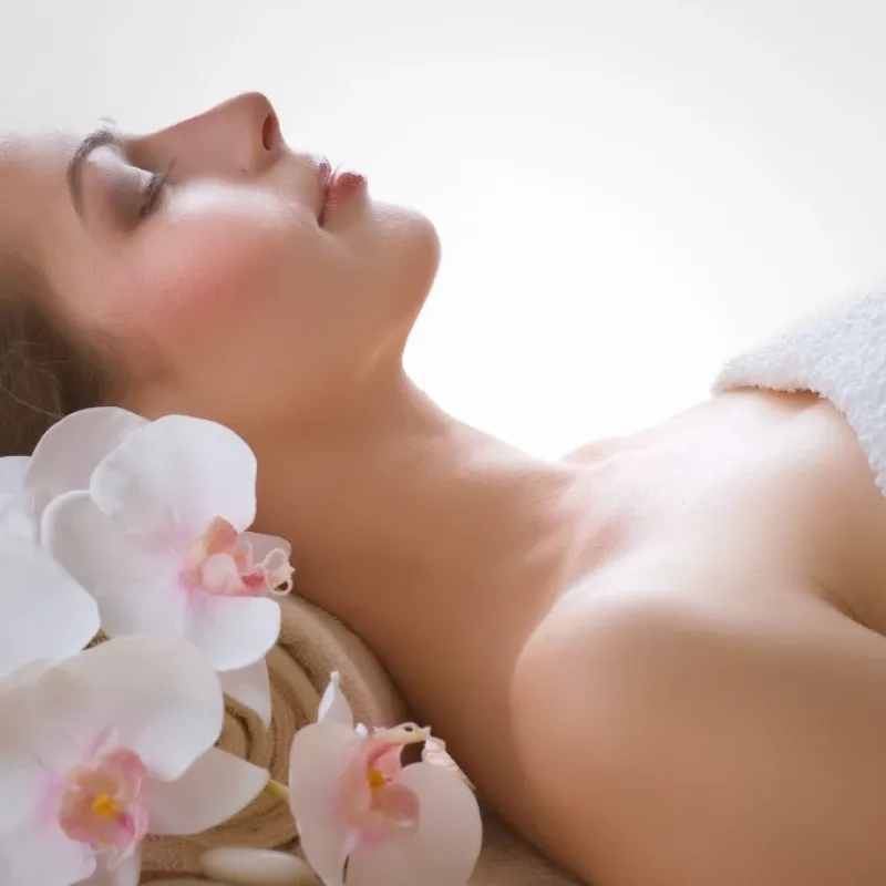 Woman in spa for esthetician services.