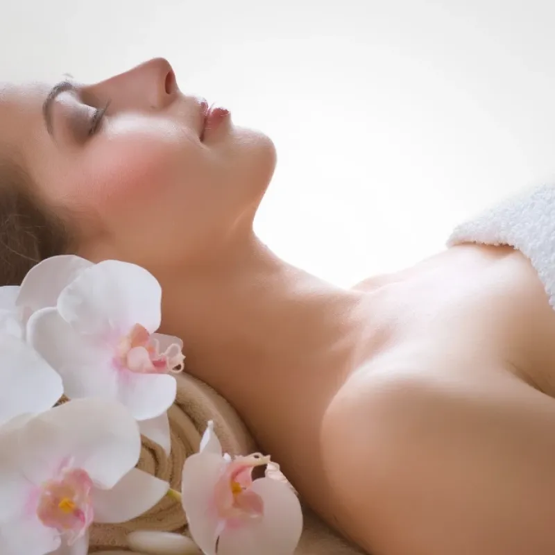 Woman in spa for esthetician services.