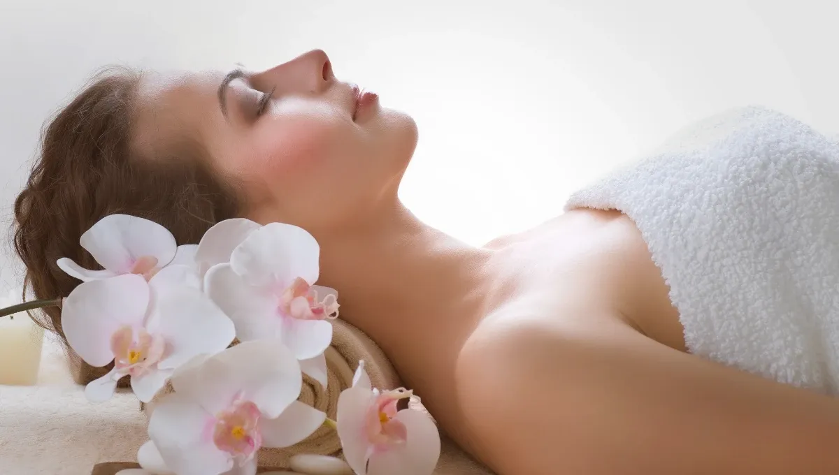 Woman in spa for esthetician services.